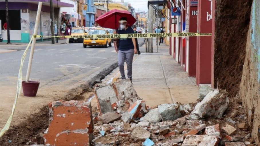 a_woman_walks_by_debris_from_a_building_damaged_by_the_earthquake_in_oaxaca_mexico.jpeg (87.4 KB)